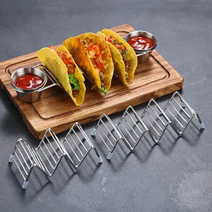 Stainless steel taco holder set with sauce cups on wooden board