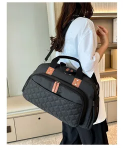 Grand sac de voyage imperméable avec séparation humide et sèche pour le sport et fitness.