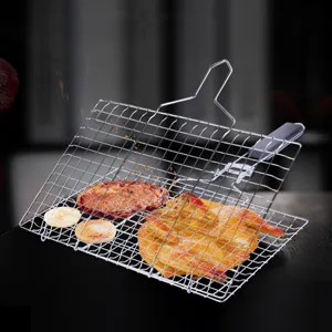 Detail of stainless steel folding BBQ grill net holding a whole roasted chicken and steak