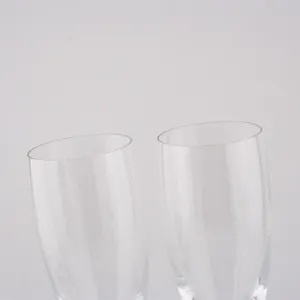 Macro view showing the smooth rims and clear glass of these crystal champagne glasses for weddings