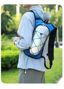 Rear view of a man wearing a blue hydration pack with iridescent reflective panels