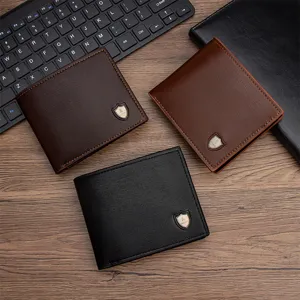 Detail view of stylish men's bifold PU leather wallets in black and brown colors.