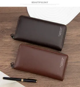 Close-up of two brushed leather men's long zip-around wallets in brown and coffee colors.