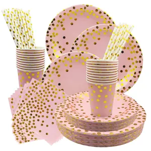 Set di stoviglie usa e getta rosa e oro con piatti, bicchieri e tovaglioli per feste
