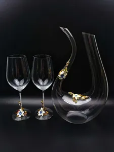 Crystal wine glass decanter set with decorative enamel floral design for elegant dining.