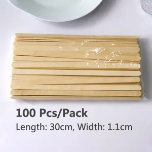 Close-up of a pack of 100 flat bamboo sticks, 30cm long and 1.1cm wide, detail view