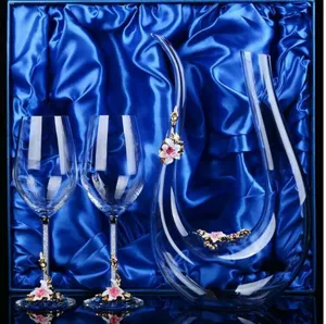 Crystal decanter and wine glasses set detail view with elegant enamel floral decor.