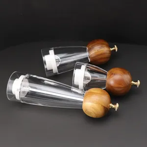 Wooden and acrylic manual pepper grinder for kitchen seasoning, transparent mill set of three.