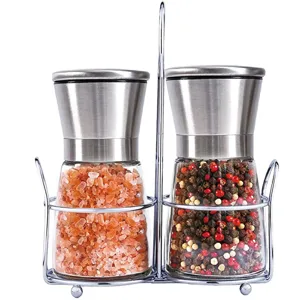 Juego de molinillo de sal y pimienta de acero inoxidable con botellas de vidrio y soporte.