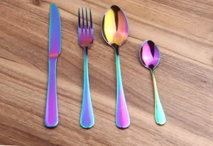 Iridescent rainbow stainless steel cutlery set with knife, fork, and spoons
