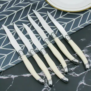 Premium Laguiole style steak knives set featuring ivory white ABS handles and signature bee motif