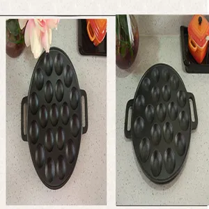 Close-up detail showing the 19-hole surface of a durable 24cm cast iron takoyaki pan