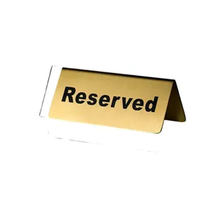 Gold stainless steel reserved tent sign for restaurant desktop table number display use.