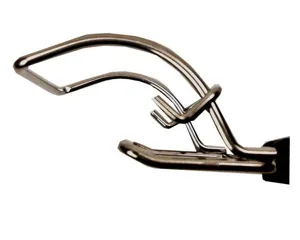 Close-up of chrome-plated bowl clip with black heat-insulated handle for oven plates
