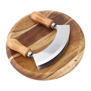 Stainless steel Mezzaluna herb cutter with wooden handles and round acacia board