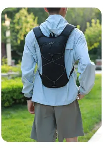 Back view of a black lightweight hydration backpack for cycling and hiking outdoors