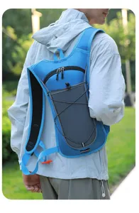 Detailed back view of a person wearing a blue outdoor hydration backpack in a park setting