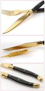 Detailansicht von vergoldetem Steakmesser und Gabel mit eleganten schwarzen Griffen
