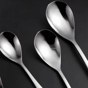 Polished stainless steel teardrop spoons in various sizes for dining and coffee