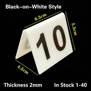 White acrylic V-shaped table number sign with black digit 10 for cafes and bars