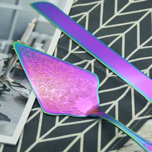 Close-up of iridescent 304 stainless steel cake knife and engraved server set