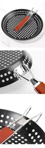 Close-up detail shot of outdoor portable BBQ grill pan with folding wooden handle and holes.