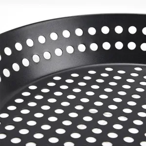 Black non-stick BBQ grill pan with round perforated holes for outdoor camping and barbecue cooking.