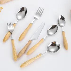Premium 304 stainless steel cutlery set with natural ash wood handles for dining