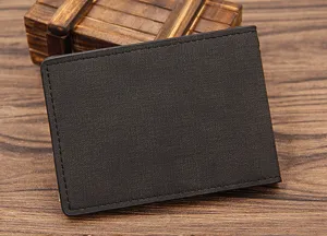 Detailed close-up view of a textured black leather business driver's license case