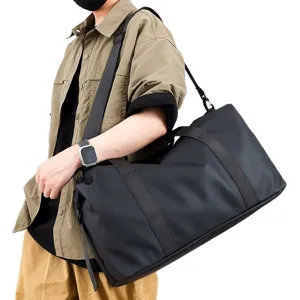 Sac de sport noir pour homme avec séparation humide-sec et compartiment à chaussures dédié