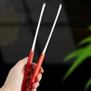 Professional stainless steel food tongs with red rubber handle and serrated tips for BBQ