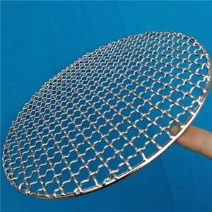 Detail view of circular stainless steel BBQ grill mesh with sturdy woven wave pattern