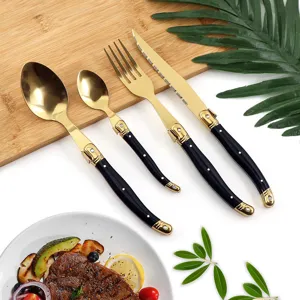Elegantes 4-teiliges Besteckset aus vergoldetem Edelstahl mit schwarzen Kunststoffgriffen