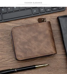 Top-down detail of a vintage brown leather wallet with a sturdy zipper on wood desk.