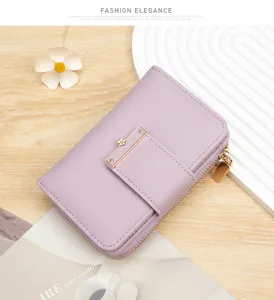 Detail of purple lychee grain women's short wallet with zipper and elegant buckle closure.