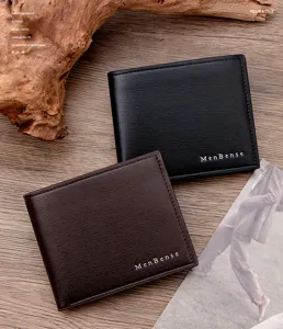 Detailed view of black and brown men's wallets with brushed texture and MenBense logo.