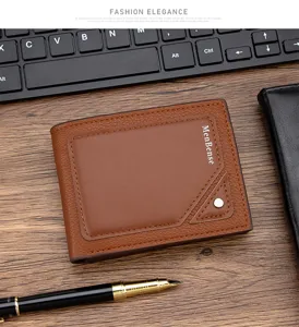 Premium brown embossed leather men's wallet displayed with office accessories like a pen