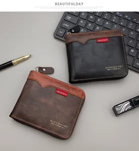 Detailansicht modischer Bifold-Geldbörsen mit Patchwork-Lederdesign und Rundum-Reißverschluss.