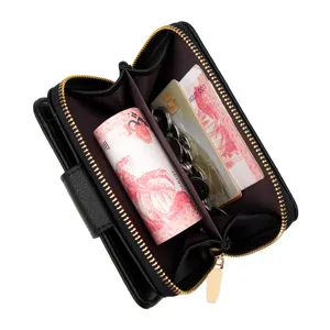 Black lychee pattern women's short wallet with gold zipper showing cash and card storage