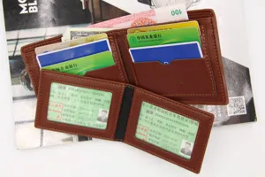 Detail shot of brown leather men's wallet showing multiple card slots and cash capacity