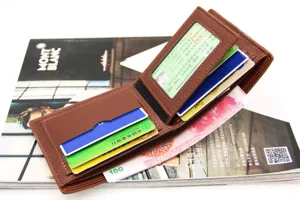 Close-up of brown leather bifold wallet showing multiple card slots and cash capacity