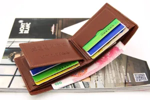 Brown leather bi-fold wallet for men with card slots and driver's license holder detail view