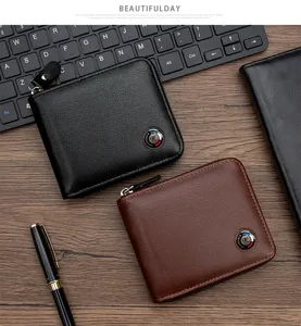 Macro detail of men's short zip-around wallets in black and brown brushed leather
