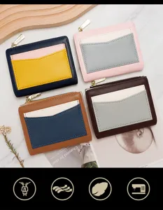 Detailed view of four trendy color-blocked women's short wallets with zipper closure.