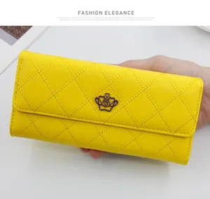Bright yellow quilted long wallet for women featuring an elegant gold crown emblem
