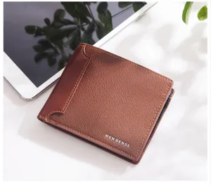 Close-up of MenBense brown PU leather wallet with textured finish and brand logo