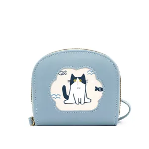 Süßer blauer münzbeutel in muschelform mit cartoon-katzen-illustration
