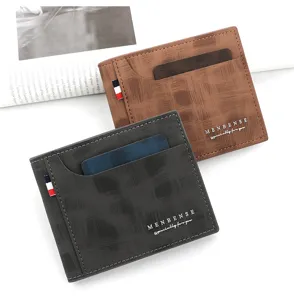 Vista de cerca de carteras cortas para hombres en marrón y gris con tarjeteros