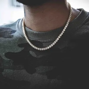 Gold tennis chain necklace featuring single row sparkling round rhinestones for hip hop style.