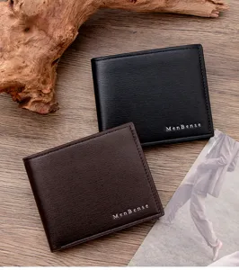 Macro view of two men's business wallets showing premium brushed texture and logo